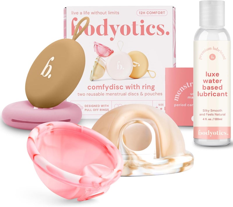 Bodyotics حزمة قرص الحيض القابل لإعادة الاستخدام وزيت التشحيم الشخصي - 2 قرص سيليكون للحيض (صغير وكبير، بيج/وردي)، يمكن ارتداؤه حتى 12 ساعة، زيت تشحيم مائي مناسب للسيليكون للنساء والأزواج - Image 1